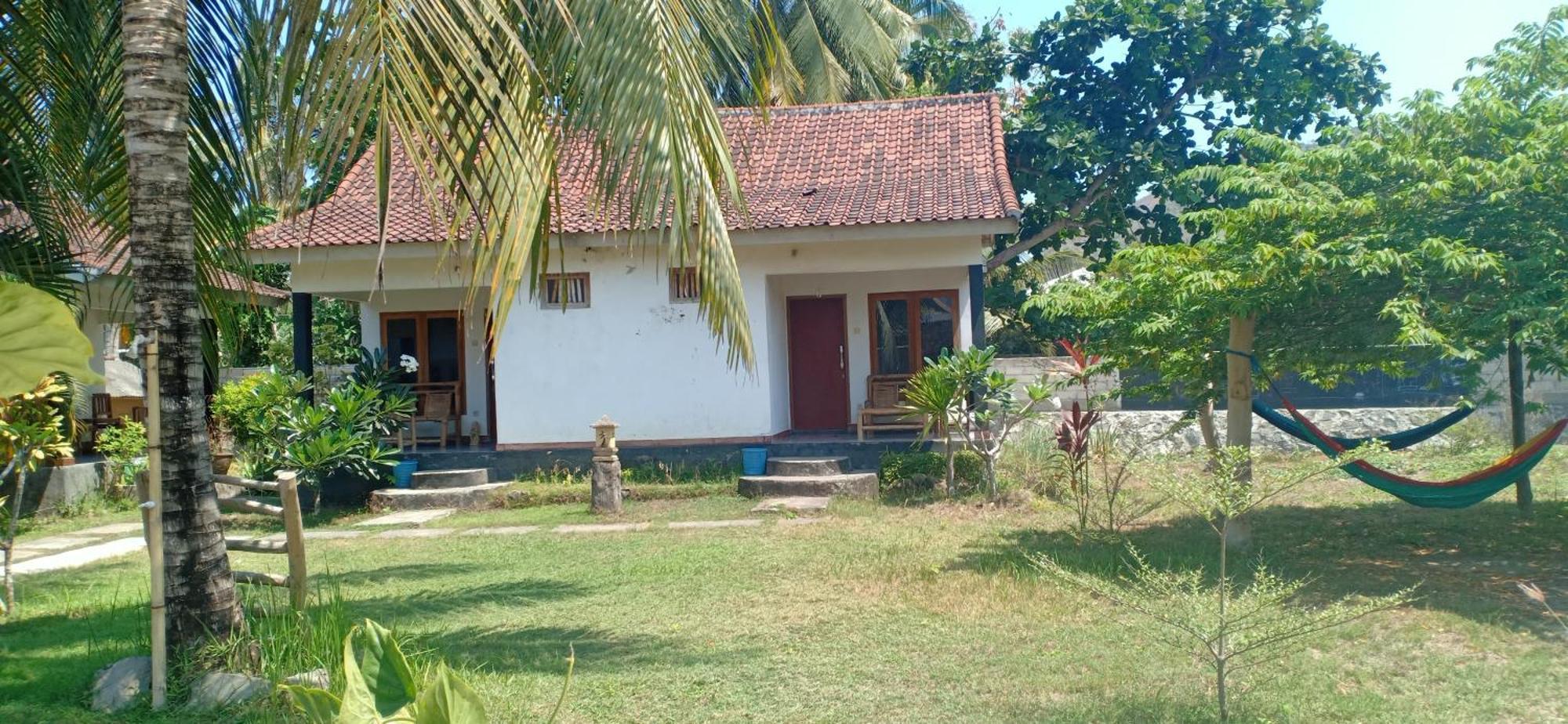 Dewi Garden Guesthouse Kuta  Экстерьер фото