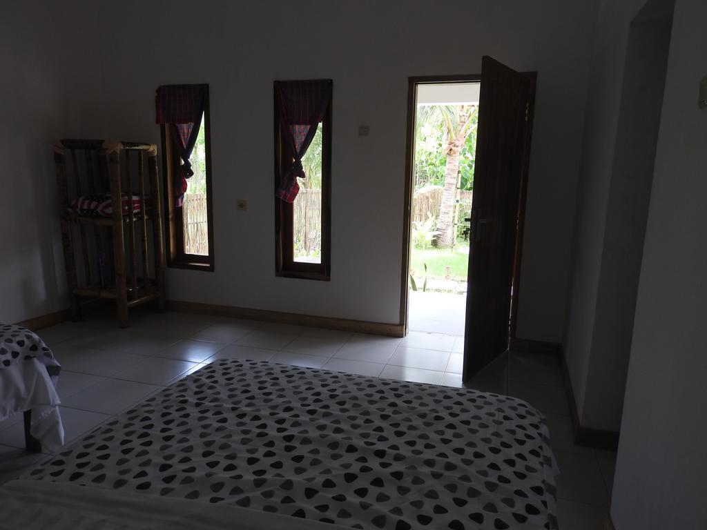 Dewi Garden Guesthouse Kuta  Экстерьер фото