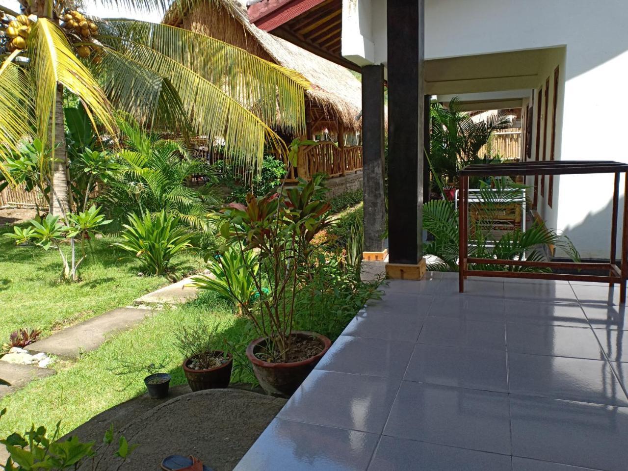Dewi Garden Guesthouse Kuta  Экстерьер фото