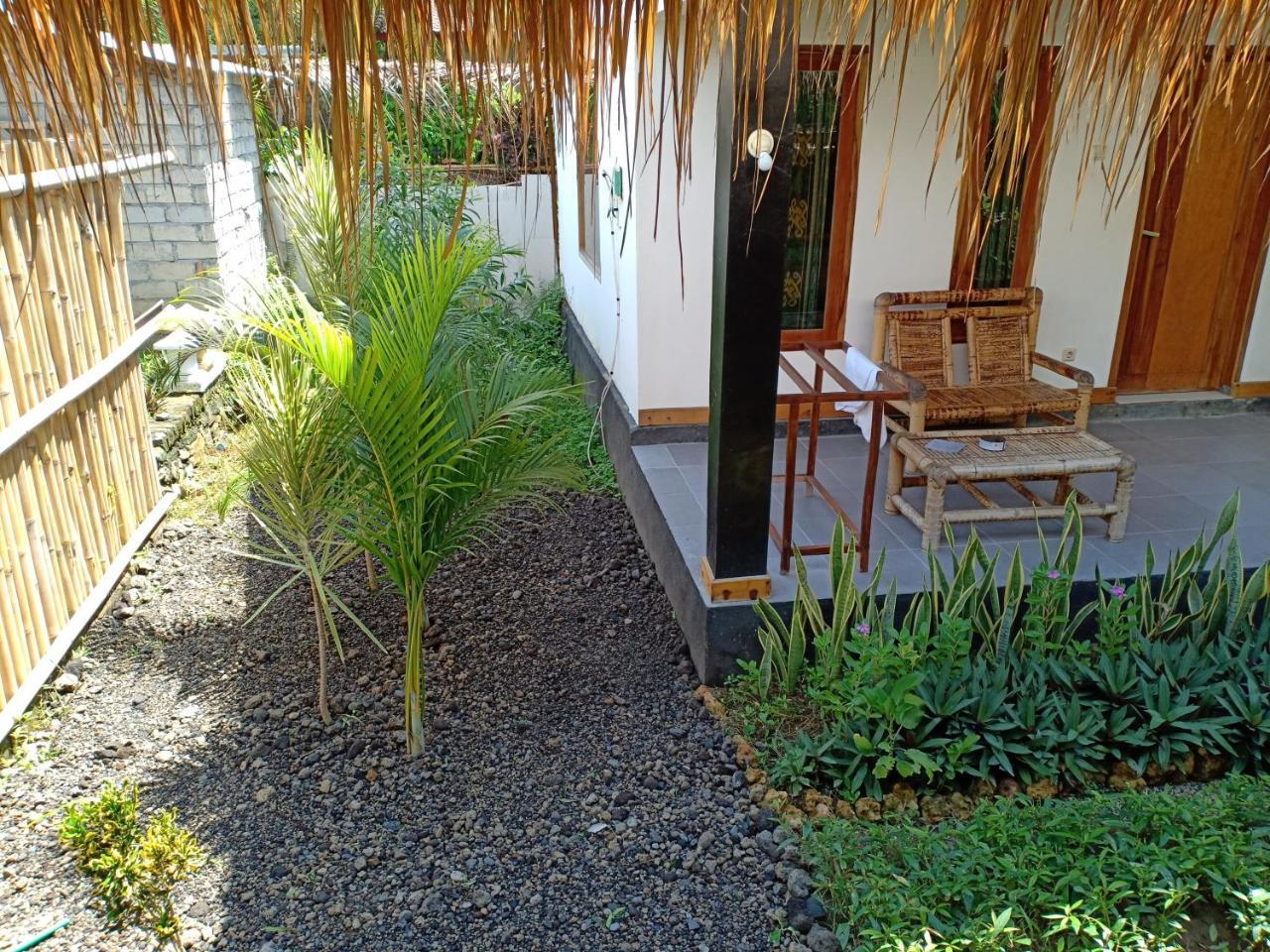 Dewi Garden Guesthouse Kuta  Экстерьер фото